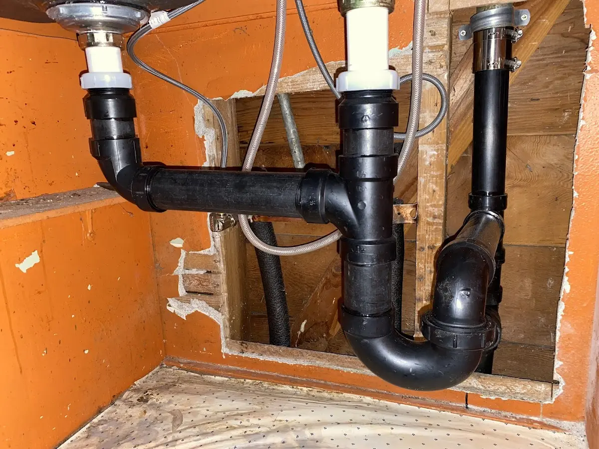 Professional Garbage Disposal Repair equipment and tools on the job in Lugoff